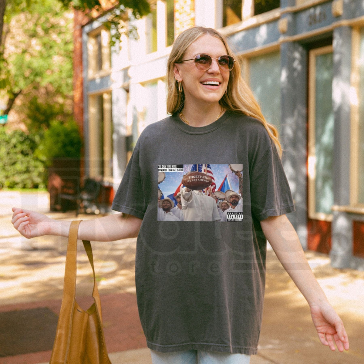 "The Only Thing More Powerful Than Hate Is Love" – Retro Unity Graphic Tee