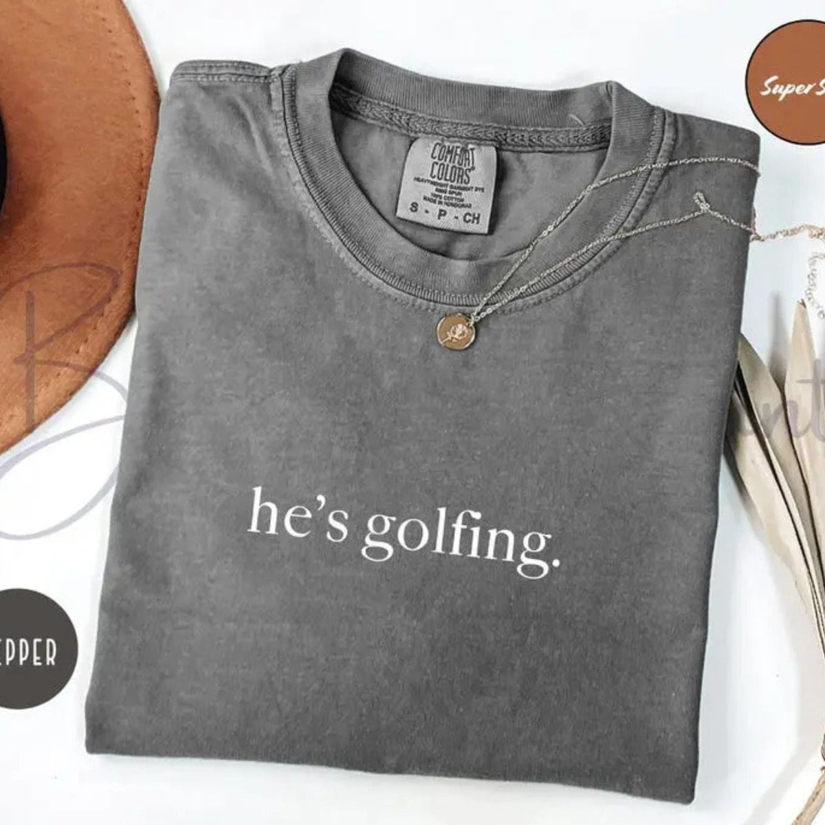 Comfort Colors "He's Golfing" Shirt – Golfer Wife Tee, Funny Golf Player Shirt, Unisex Casual Relaxed Fit, Golf Lover Gift