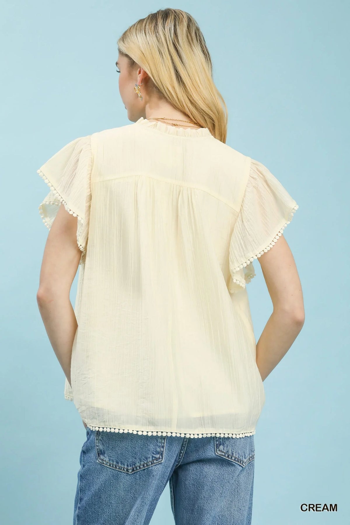 Umgee Flutter Sleeve Relaxed Top with Trim Detail