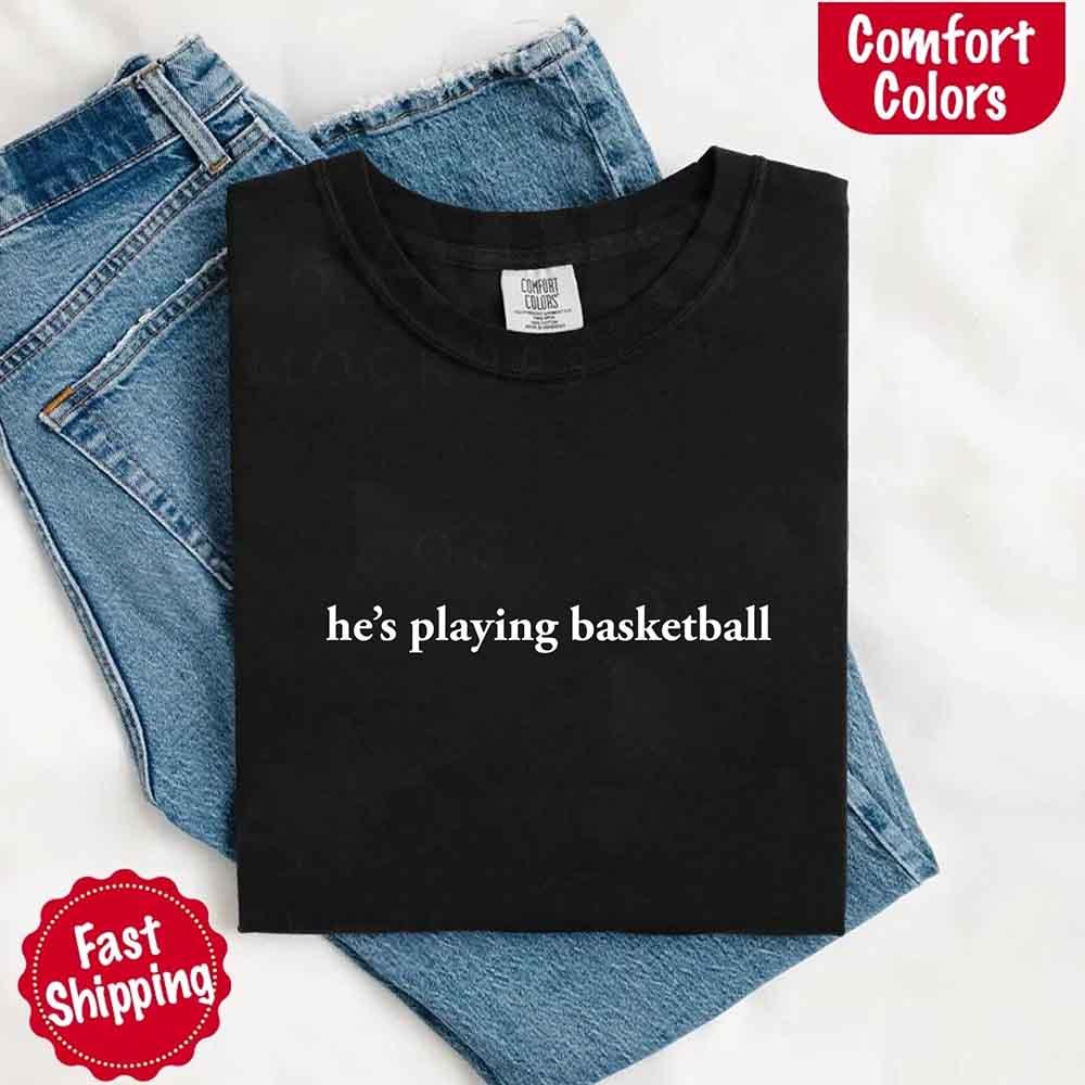 He’s Playing Basketball – Funny Sports Girlfriend Comfort Color Shirt for Women