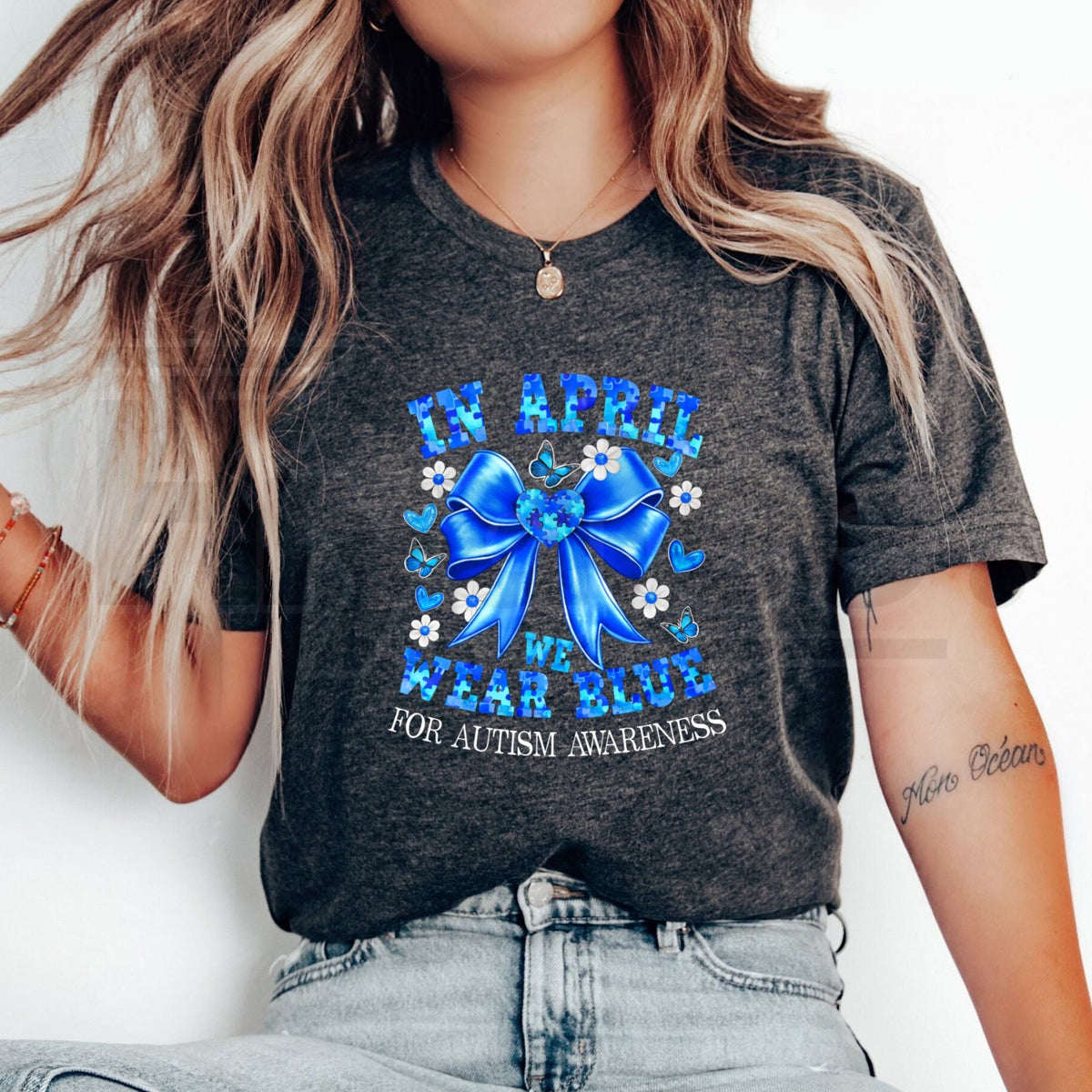 "April We Wear Blue" Autism Awareness – Coquette Bow Puzzle Graphic