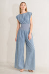 RUNNING IN DENIM JUMPSUIT