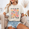Flowers And Pumpkins Watercolor Halloween Autumn Garden Scene With Soft Moody Glow Graphic Tee