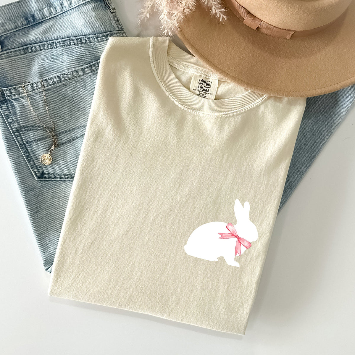 Whimsical Bunny With Bow Pocket Print Easter Rabbit Illustration For Spring Season Comfort Colors Tee