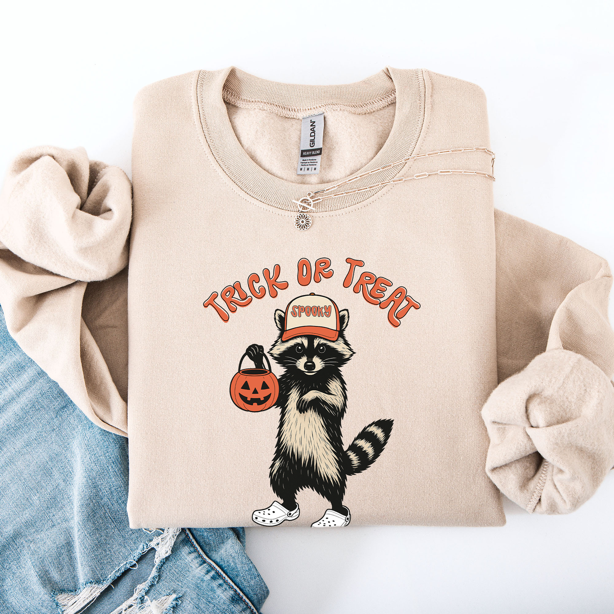 Raccoon Trick Or Treat Halloween Spooky Cozy Nighttime Autumn Theme Seasonal Fun Sweatshirt
