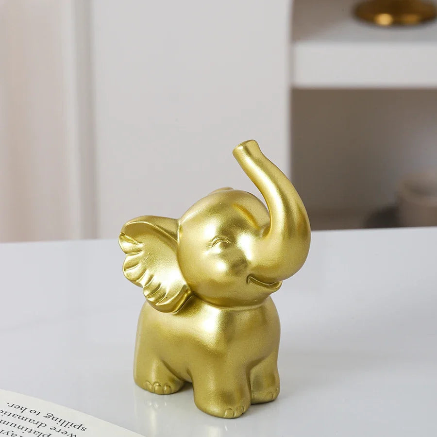 1pc Collectible figurine  , Simple modern black and gold elephant ornament home decor small sculpture.