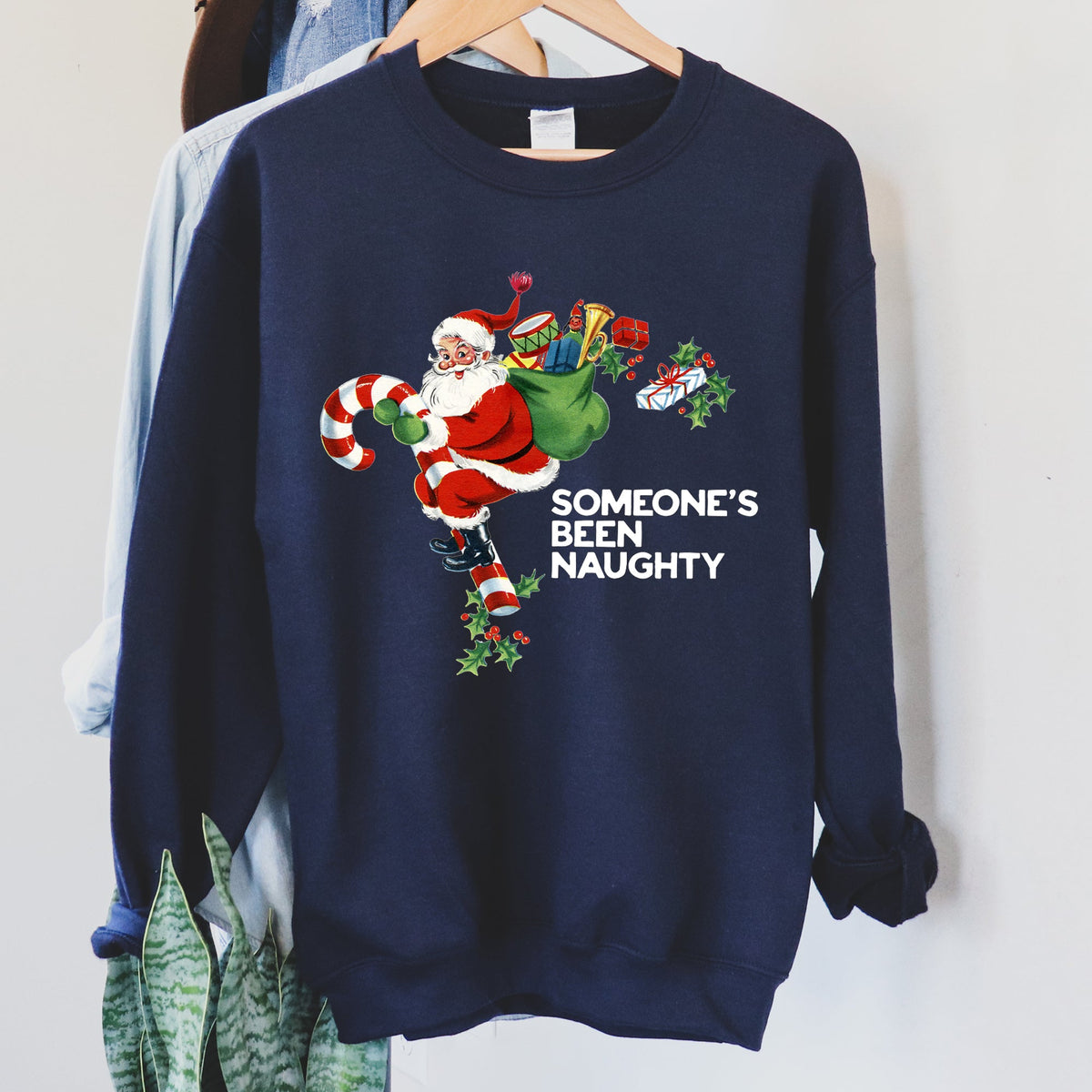 Someone's Been Naughty Santa Christmas Holiday Edition Festive Cozy Graphic Sweatshirt