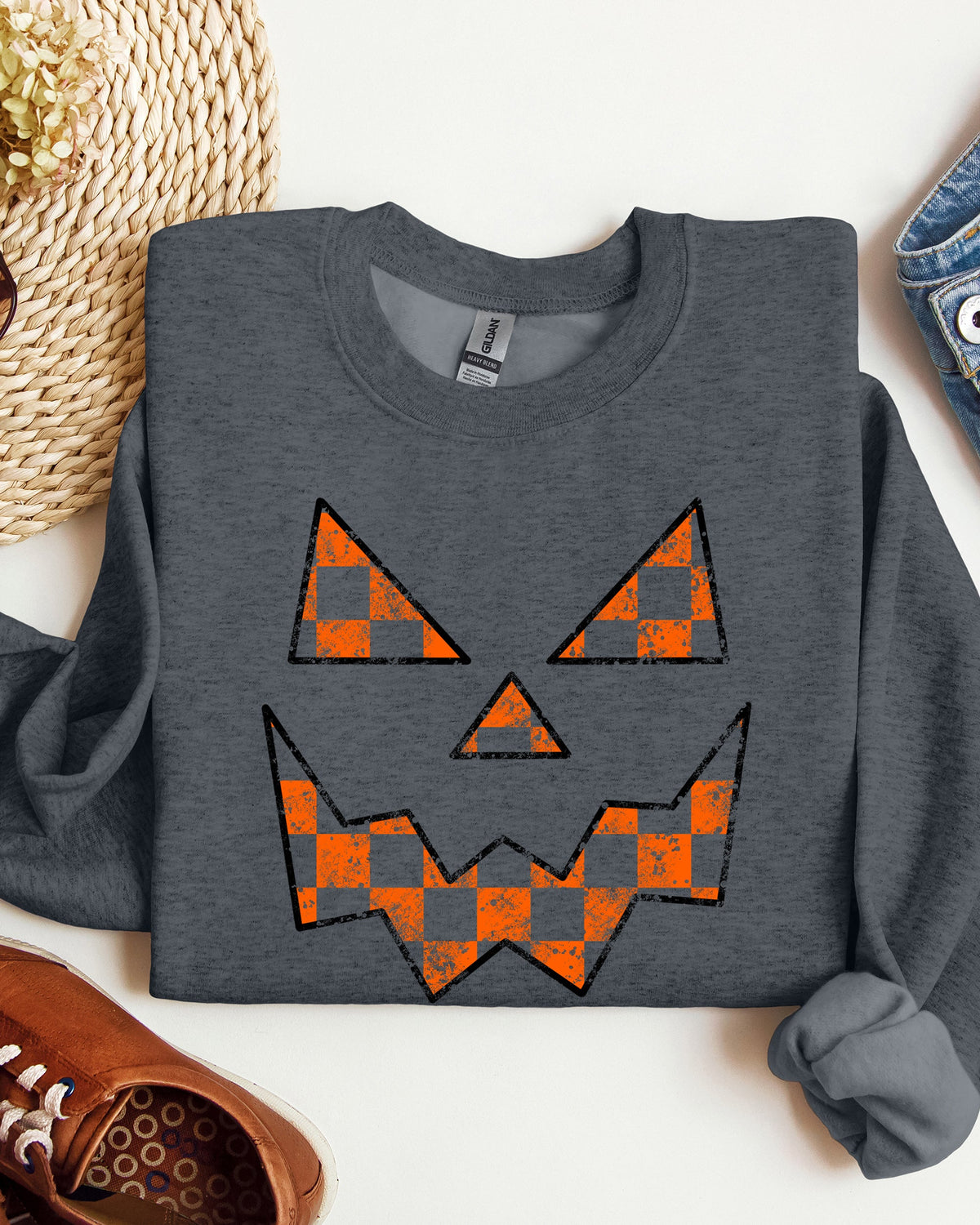 Spooky Jack-O-Lantern Retro Halloween Pumpkin Checkered Graphic Cozy Seasonal Sweatshirt