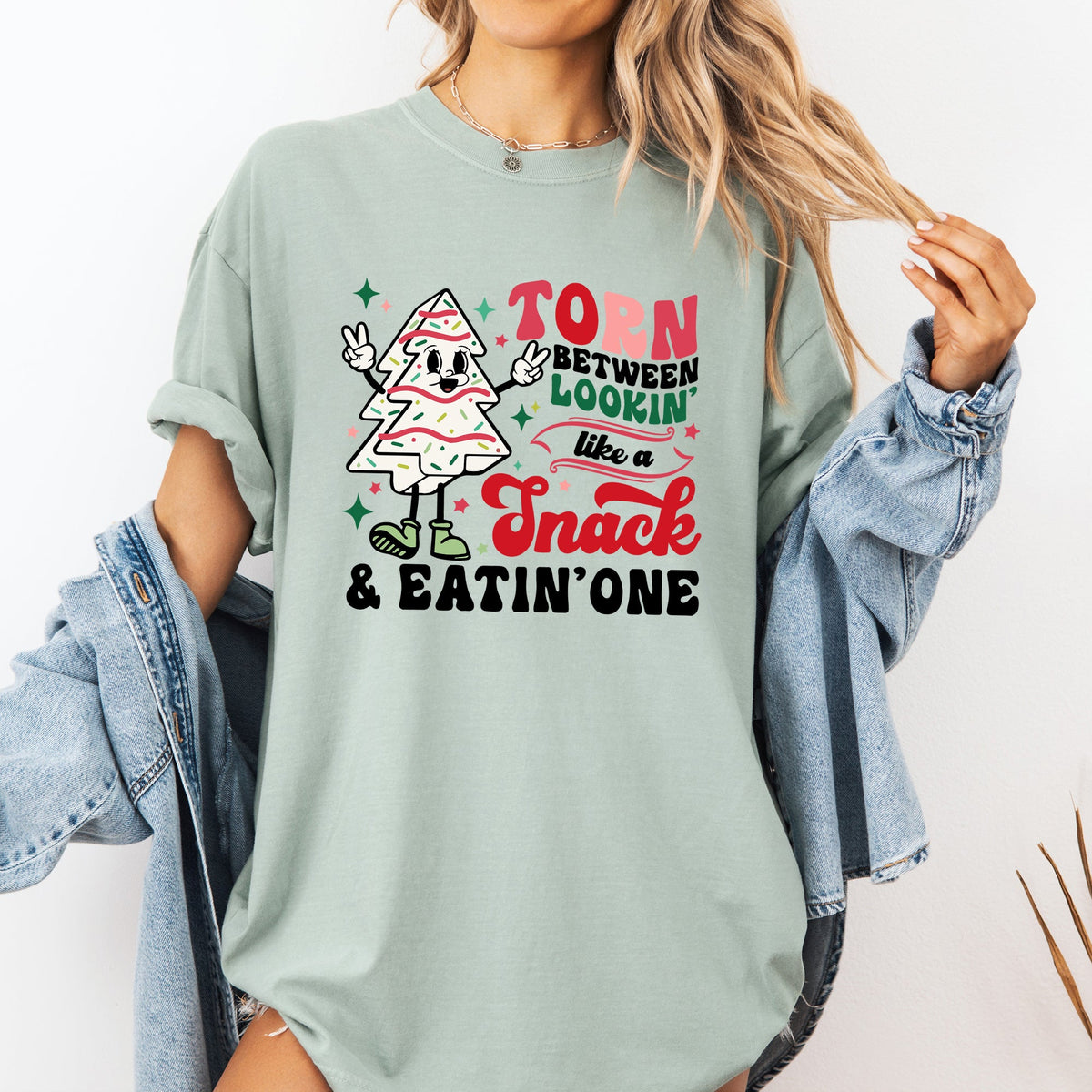 Torn Between Looking Like A Snack And Eating One Christmas Cakes Santa Winter Xmas Comfort Colors Tee