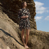 Pleione Floral Smocked Mock Neck Dress in Black