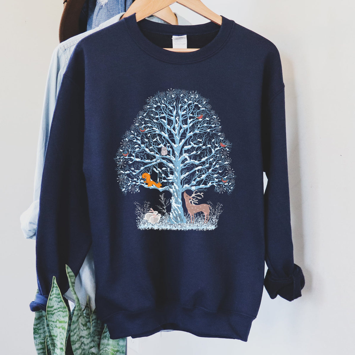 Winter Tree Filled With Animals Christmas Wildlife Woodland Scene Cozy Sweatshirt