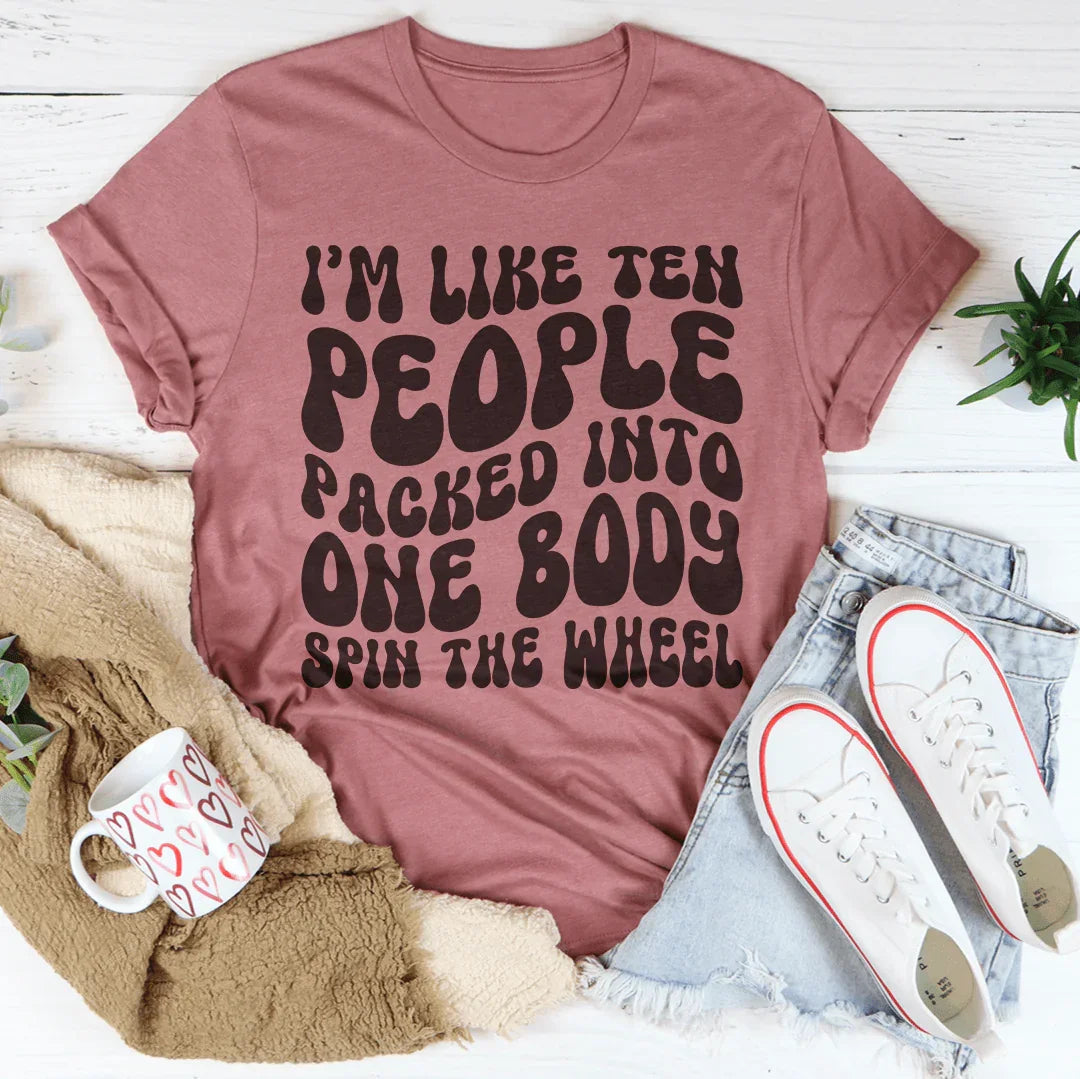 I’m Like Ten People Packed Into One Body Spin The Wheel Tee