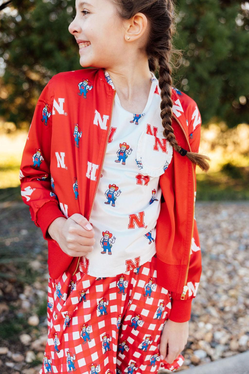 Nebraska White Herbie Husker Ruffle Pocket Tee